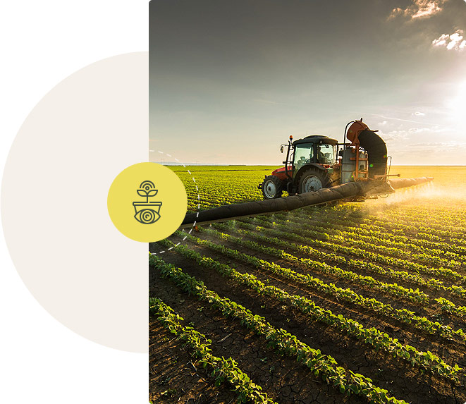 Tractor agricultural machine cultivating field.